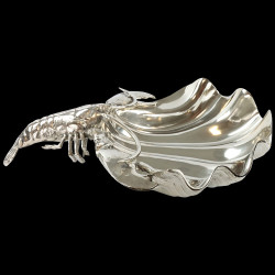Dish in shape of shell with a lobster