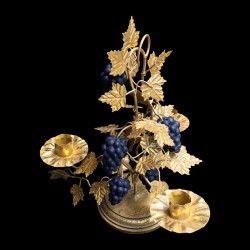Gilted candle holder and black grapes