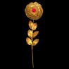 Golden rose branch with red heart