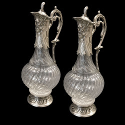 Pair of glass and silver plated ewers with Neptune mask